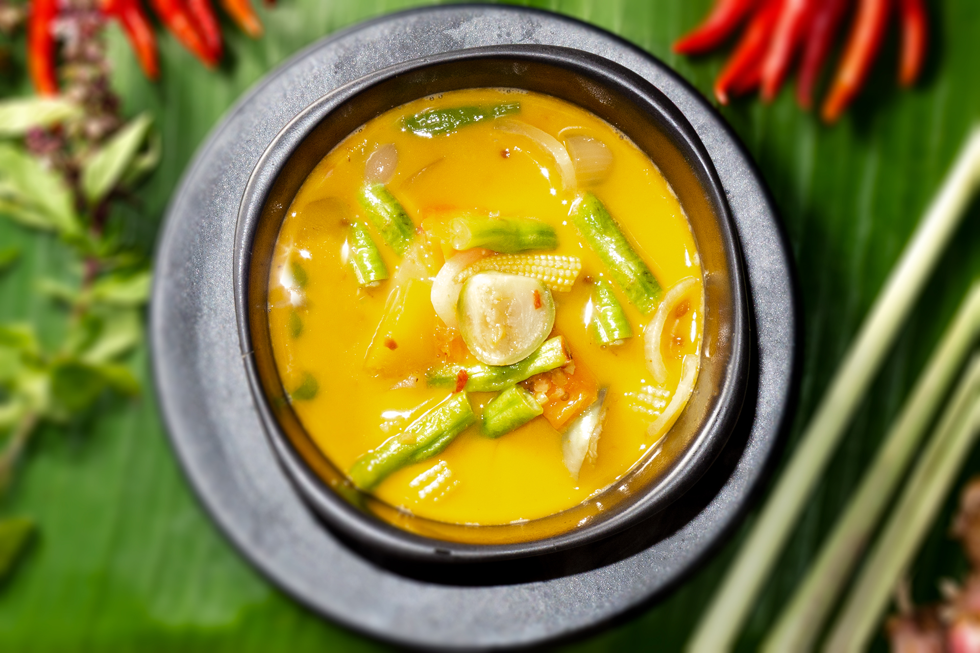 authentic Thai Massaman with vegetables or chicken, served in a bowl